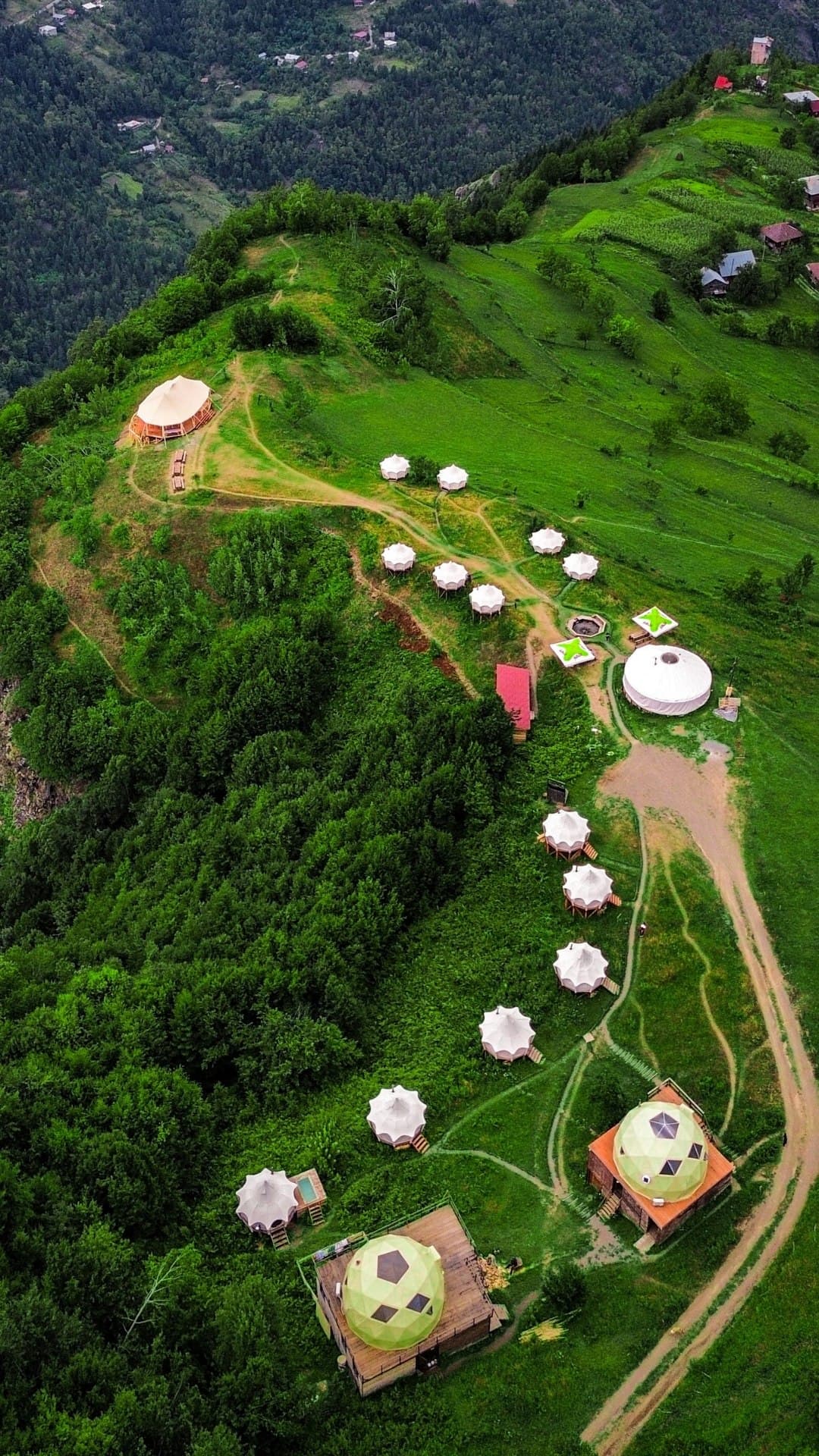 Lotus Belle tents and the dormitory dome along the ridge