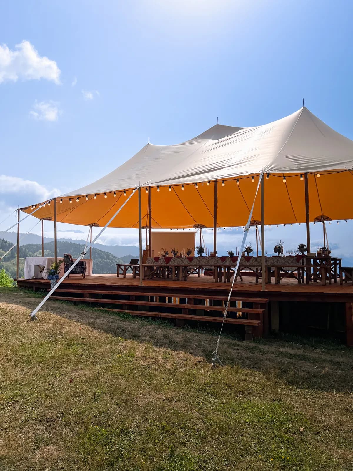 The open wedding tent with mountain views